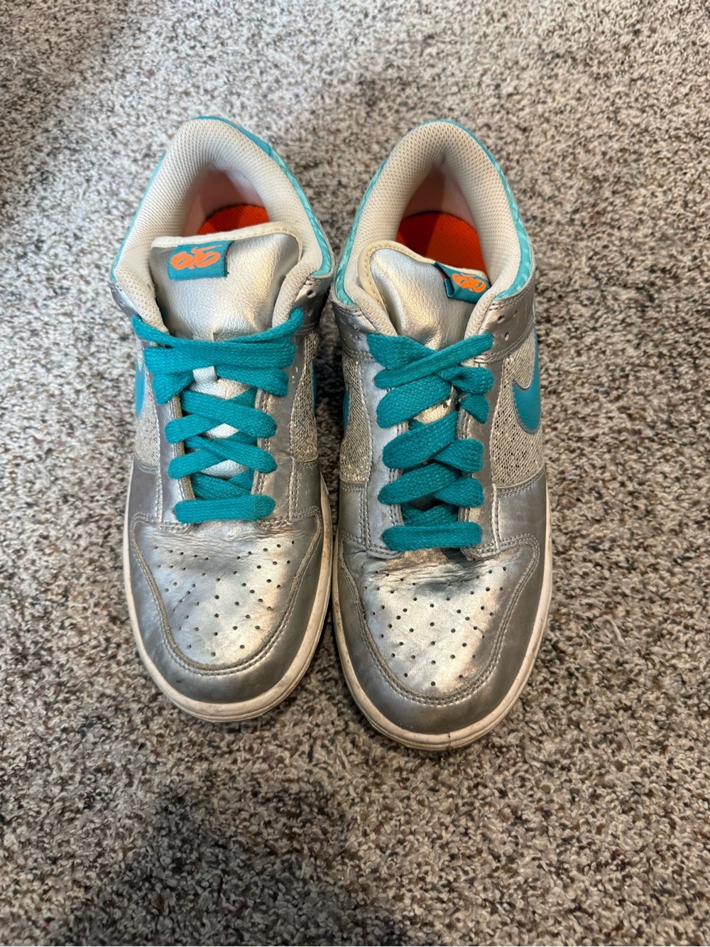 Nike Silver Sneakers with Teal Accents